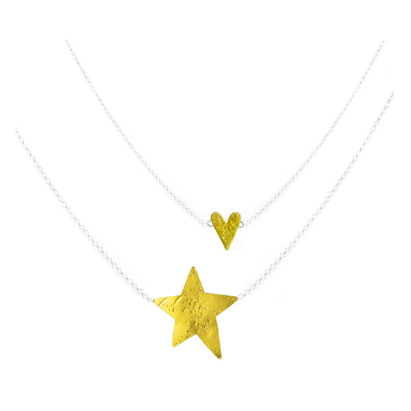 mini gold heart necklace with large star necklace by maria blondet